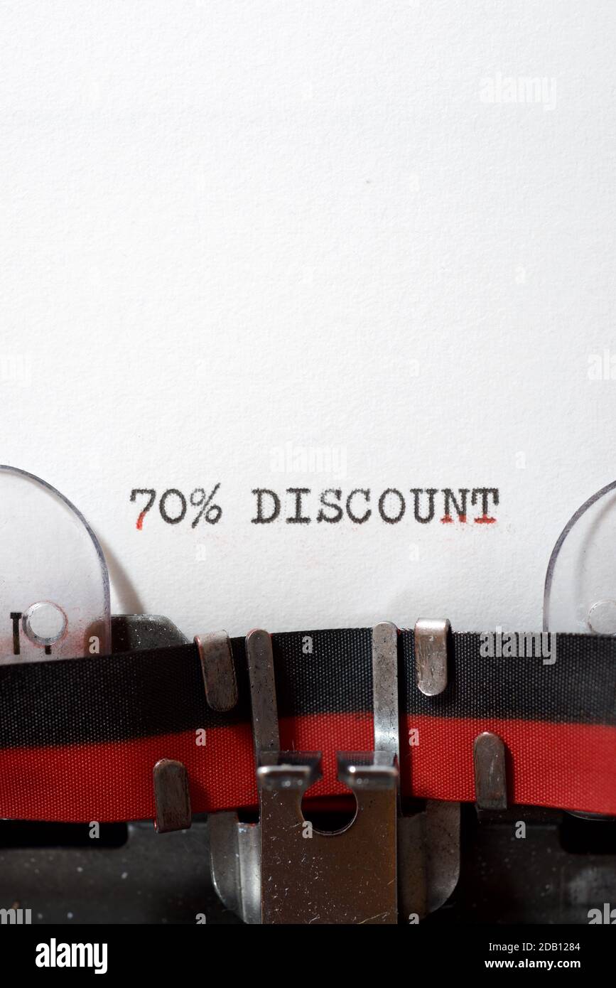 70 % discount text written on a paper. Stock Photo