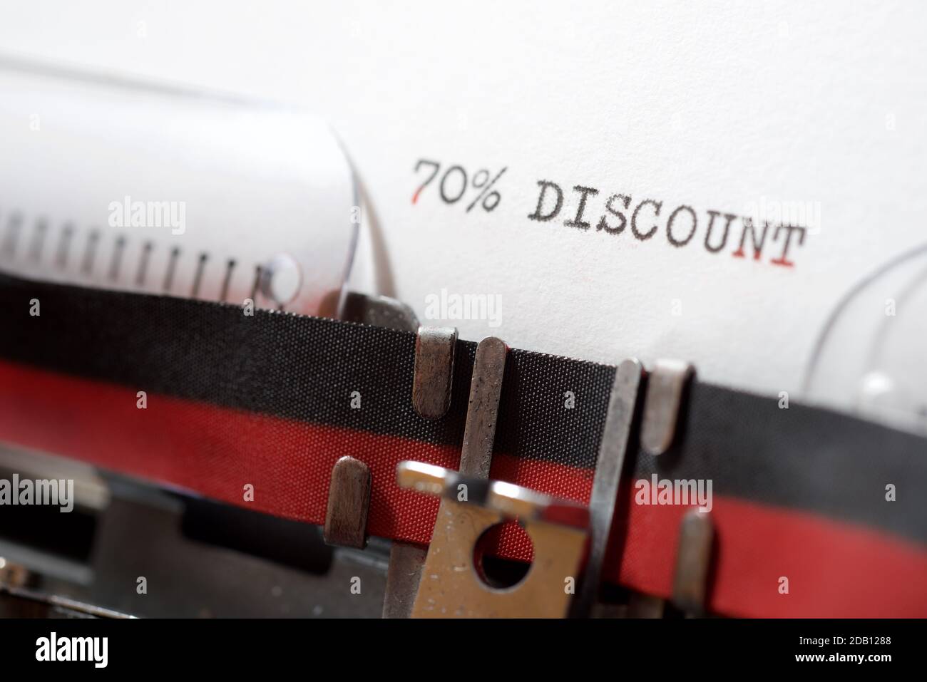 70 % discount text written on a paper. Stock Photo