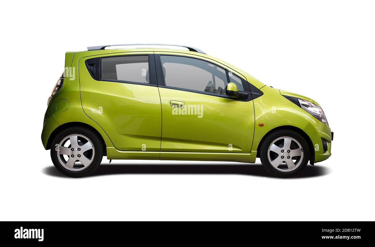 Green small hatchback car side view isolated on white background Stock Photo