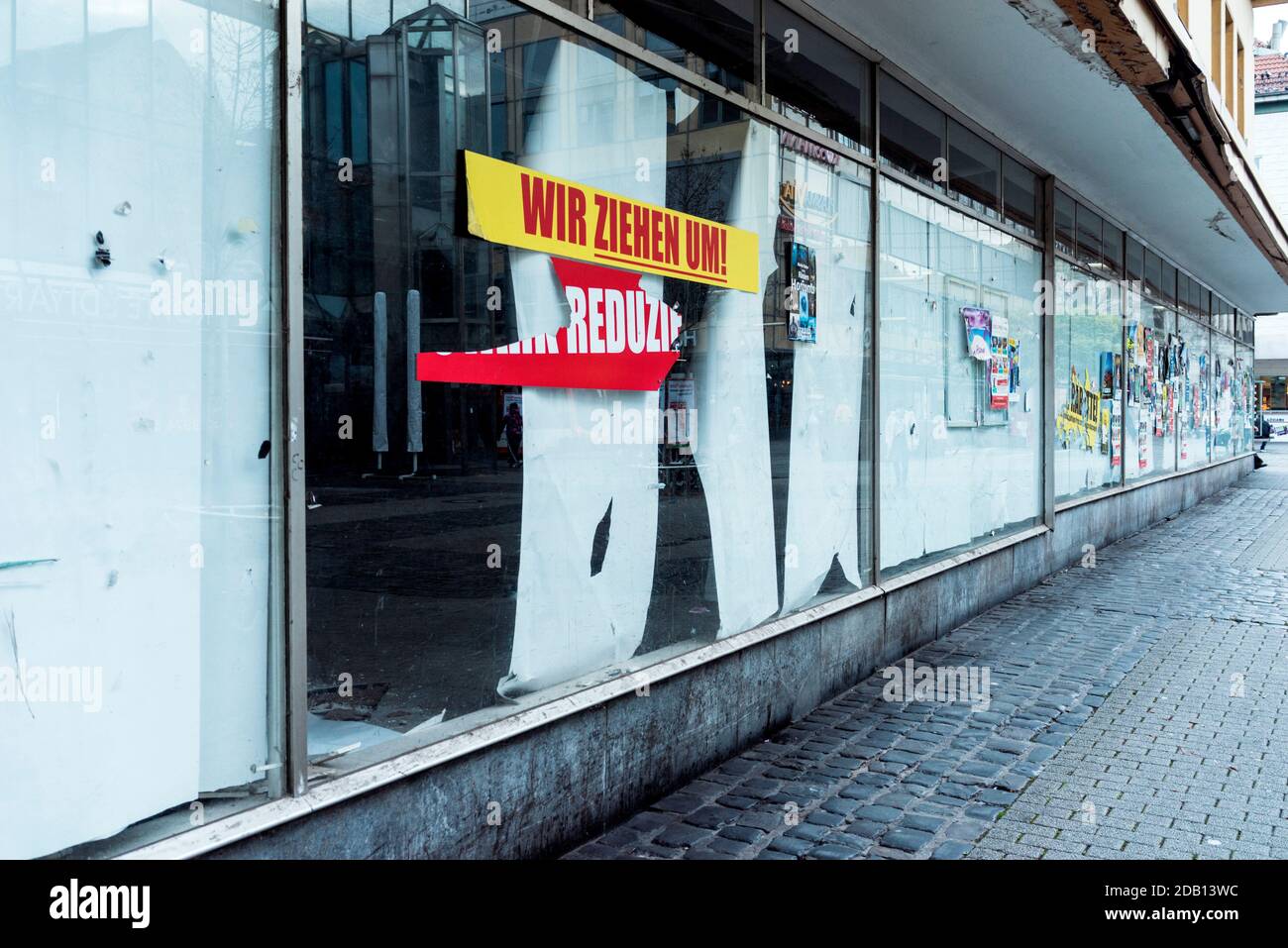 Abandoned store in Mannheim/Germany. With many local restrictions, the Covid-19 crisis has hit the retailers har, with many shops closing or reducing Stock Photo