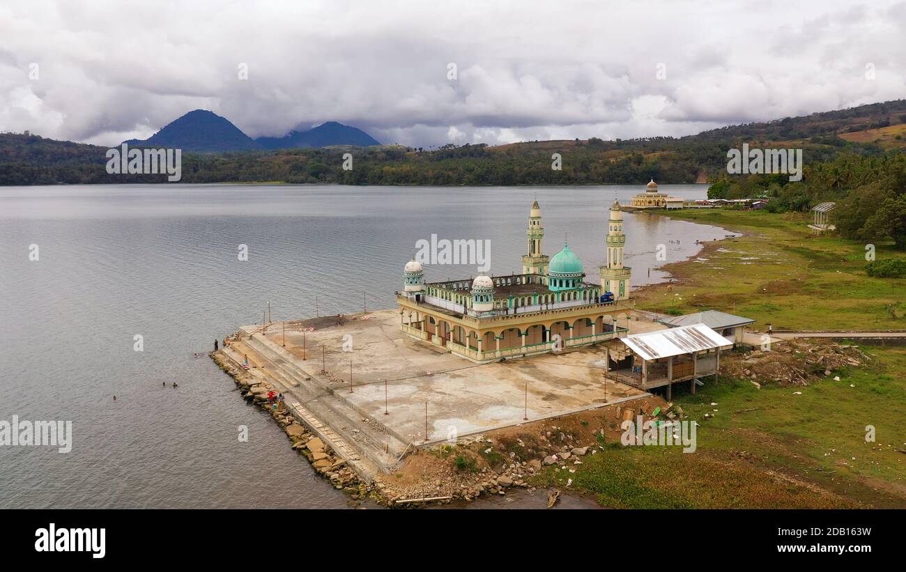 Mosque and lake Lanao surrounded by mountains. Mindanao, Lanao del Sur, Philippines. Stock Photo