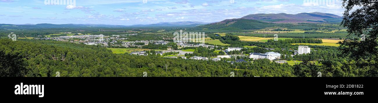 A panoramic view showing the continuing expansion Northwards of Aviemore village in Strathspey in the Scottish Highlands. Stock Photo