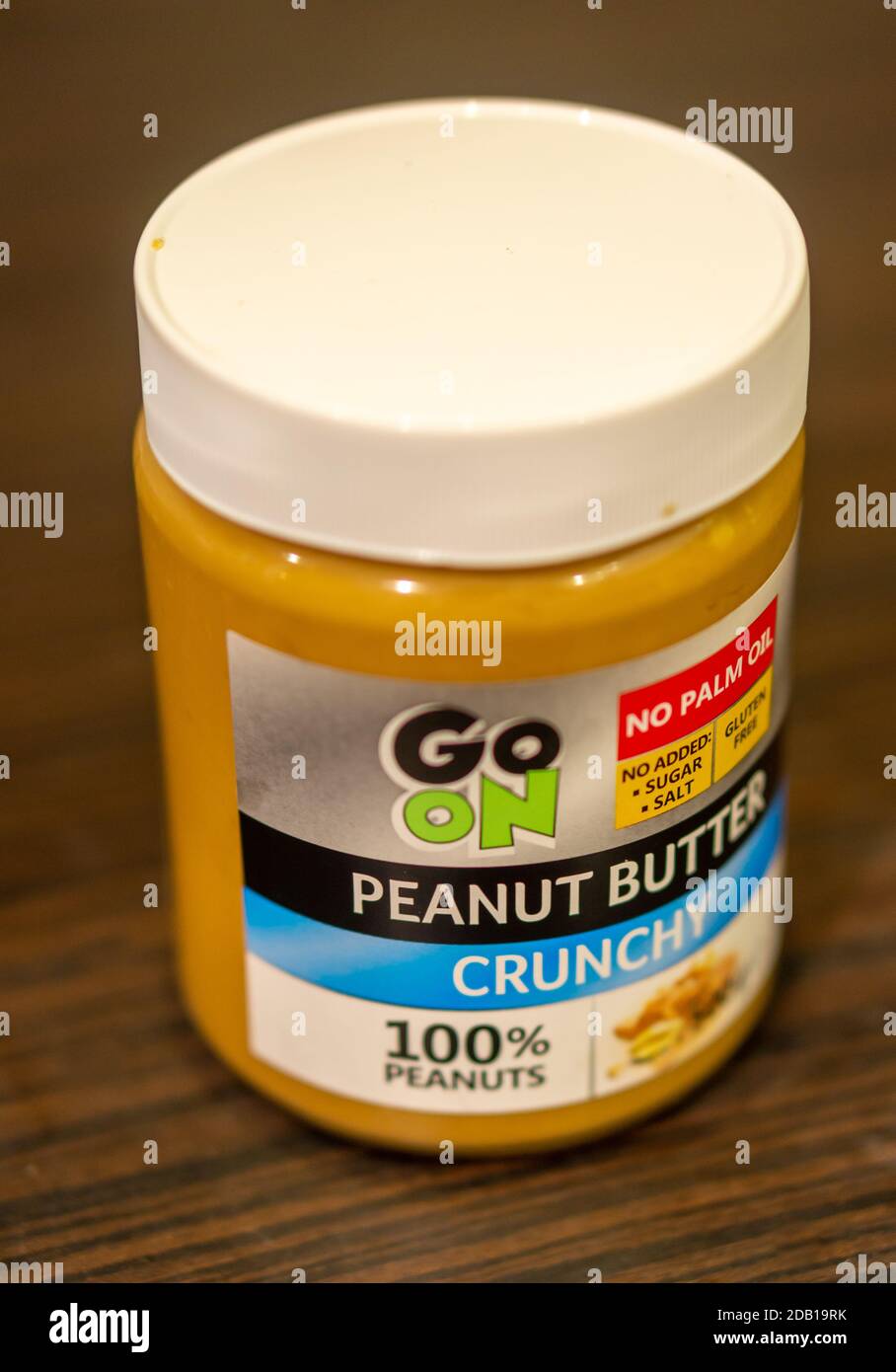 POZNAN, POLAND - Nov 14, 2020: GoOn crunchy 100 percent peanut butter in a jar Stock Photo