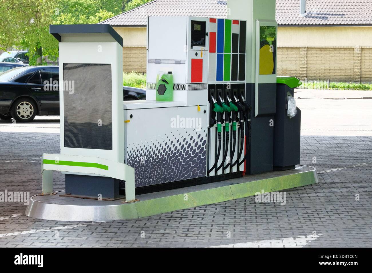Petrol station pump. Gas station and petroling concept. To fill car with fuel. Gasoline, diesel and oil products. Stock Photo