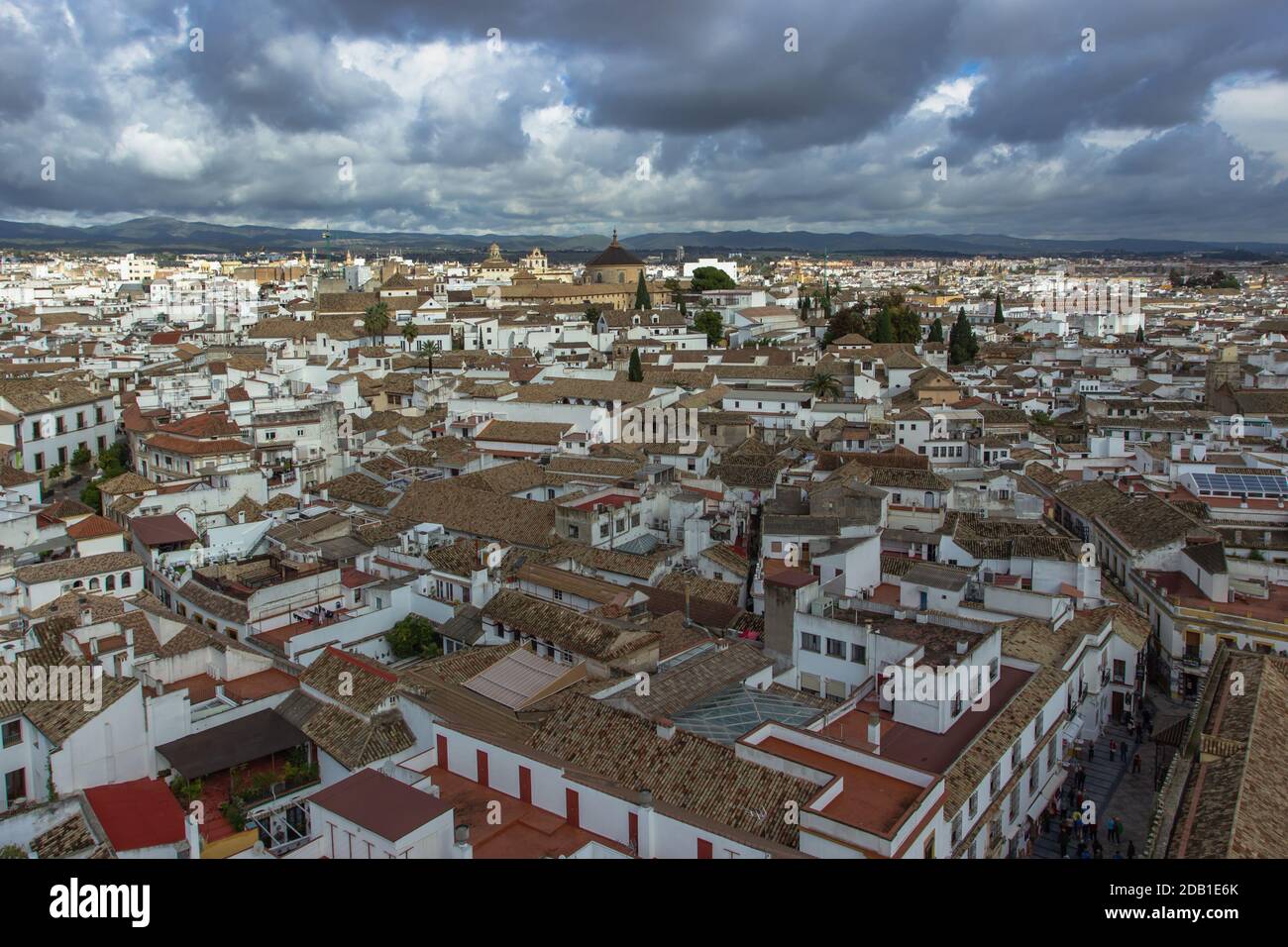 Aerial view of Cordoba,Spain on cloudy day.Spanish city panoramic view from above.White town in Andalusia.Picturesque Cordoba Jewish quarter with the Stock Photo