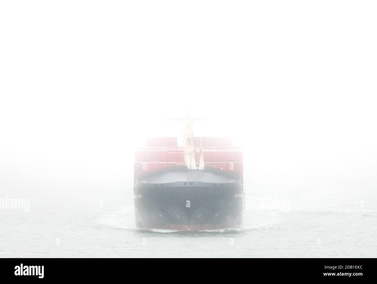 Cork Harbour, Cork, Ireland. 16th November, 2020. Container ship Independent Quest makes her way through Cork Harbour in heavy mist and fog as she departs with exports destined for Chester, Pennsylvania.  - Credit; David Creedon / Alamy Live News Stock Photo