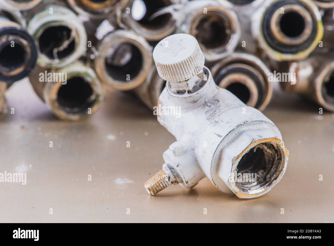 Old used plumbing fittings for water pipe installation Stock Photo Alamy