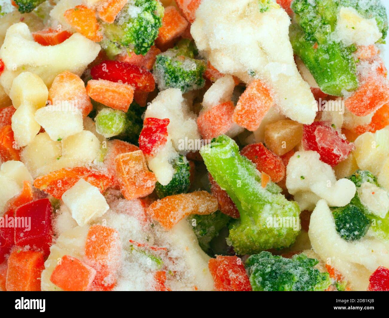 Frozen vegetables background Stock Photo - Alamy