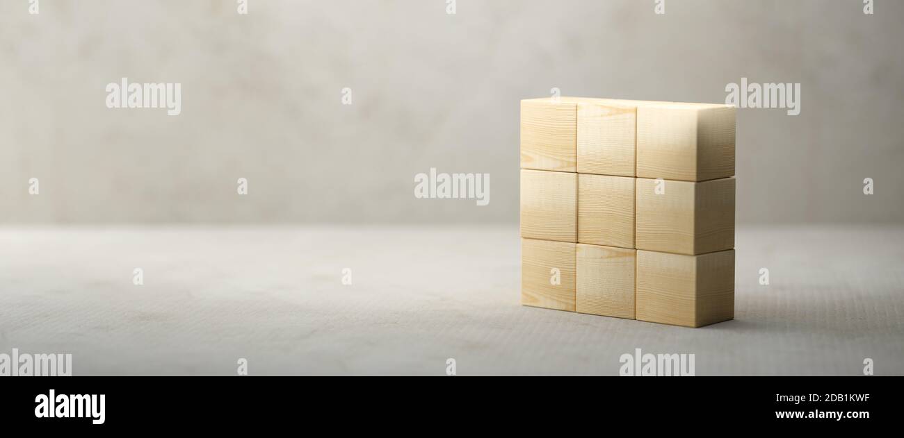empty wooden cubes for own messages and icons on paper floor in front ...
