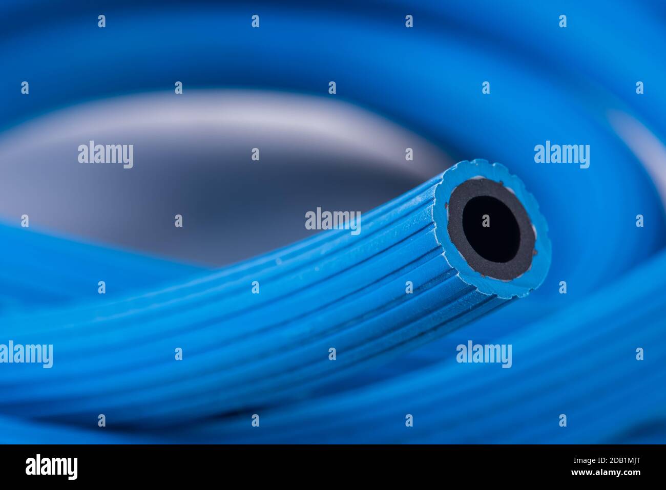 Hose for conveying oxygen in industrial applications, close-up Stock Photo