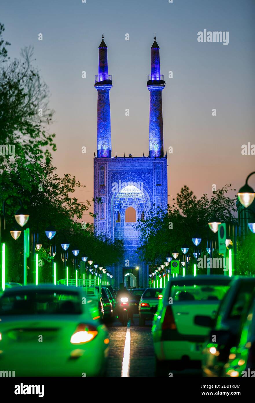 The entrance to the Jameh Mosque of Yazd is crowned by a pair of minarets, the highest in Iran, 52 meters in height and 6 meters in diameter. Stock Photo