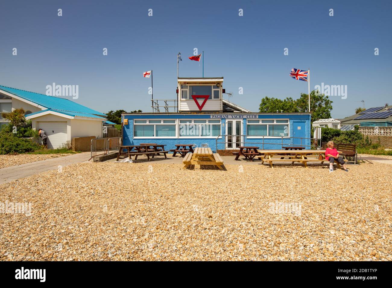 Club house for Pagham Yacht Club on the beach at Pagham on a summer day Stock Photo Alamy