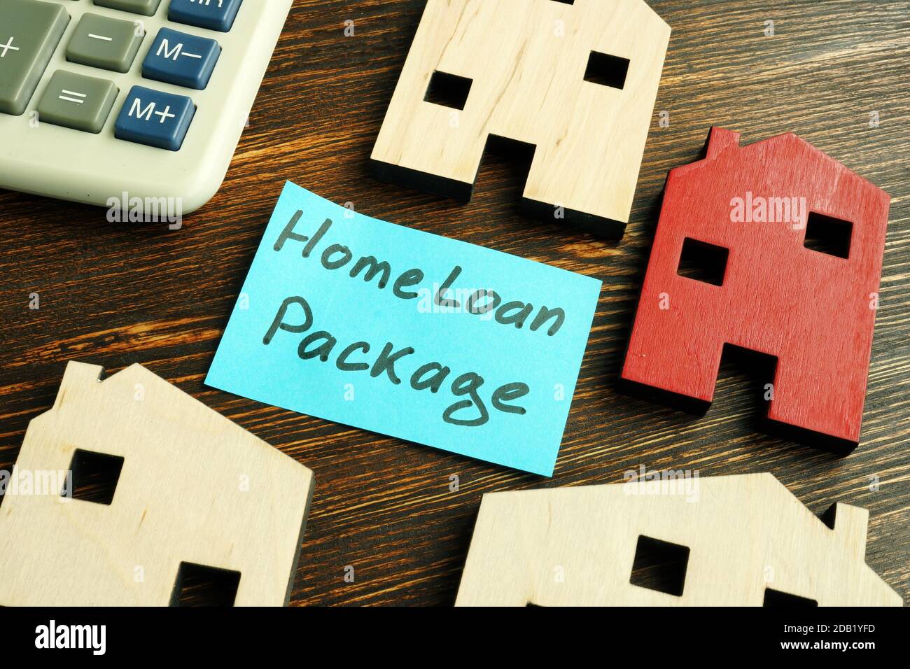 Home loan Package Mortgage. Tiny wooden houses Stock Photo Alamy