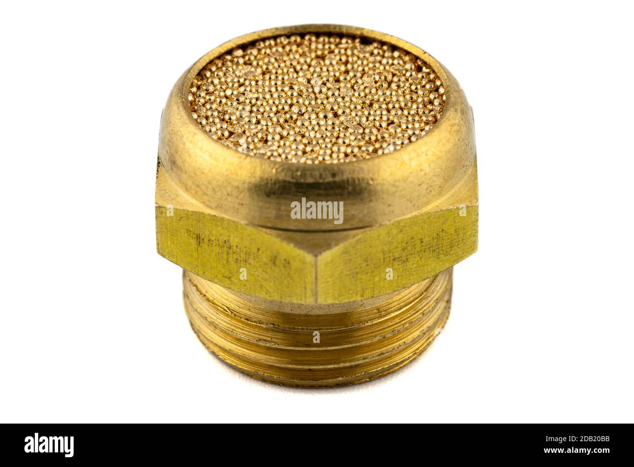 Macro shots of air silencer caked with brass balls inside, isolated on