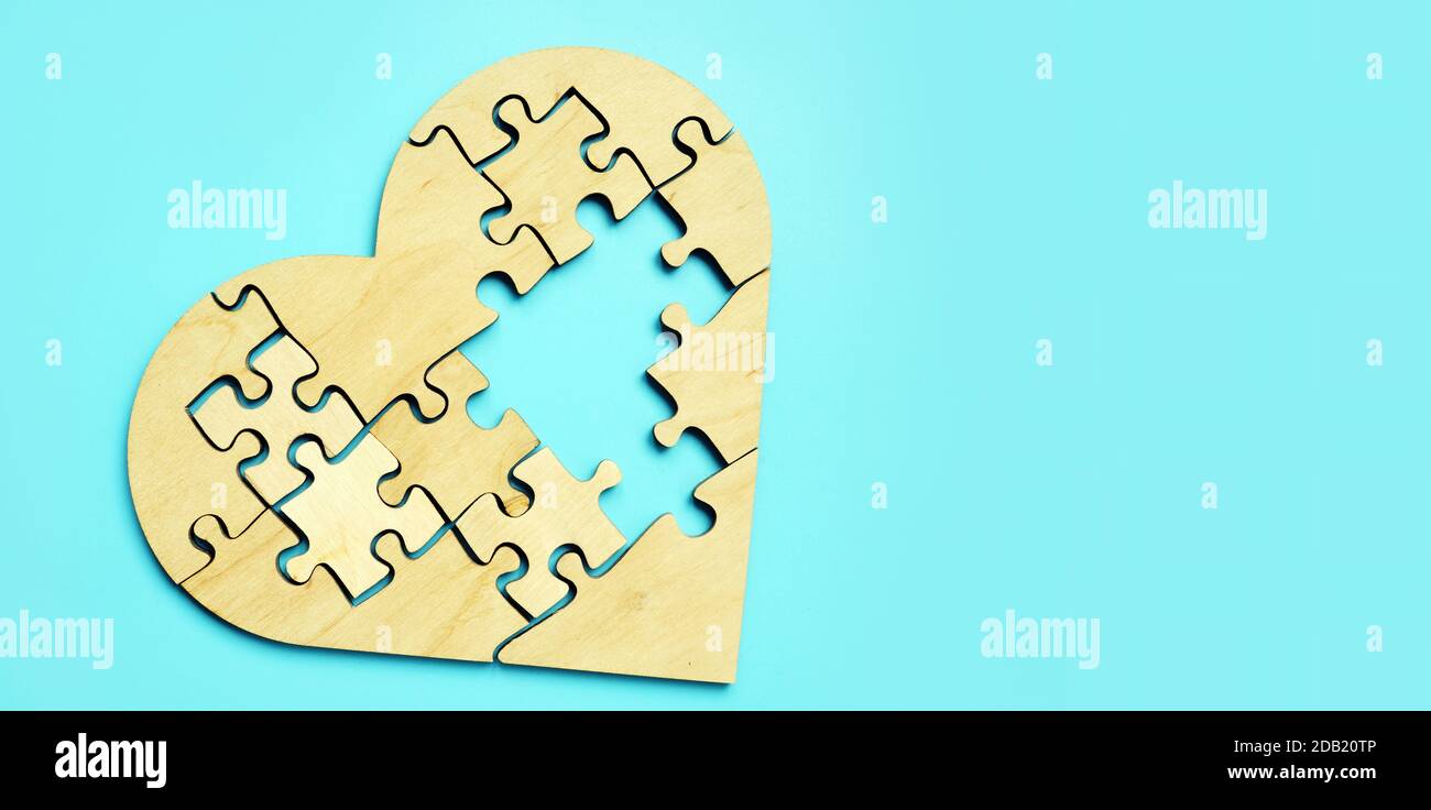 Symbol of heart disease from puzzle pieces, heart attack. Stock Photo