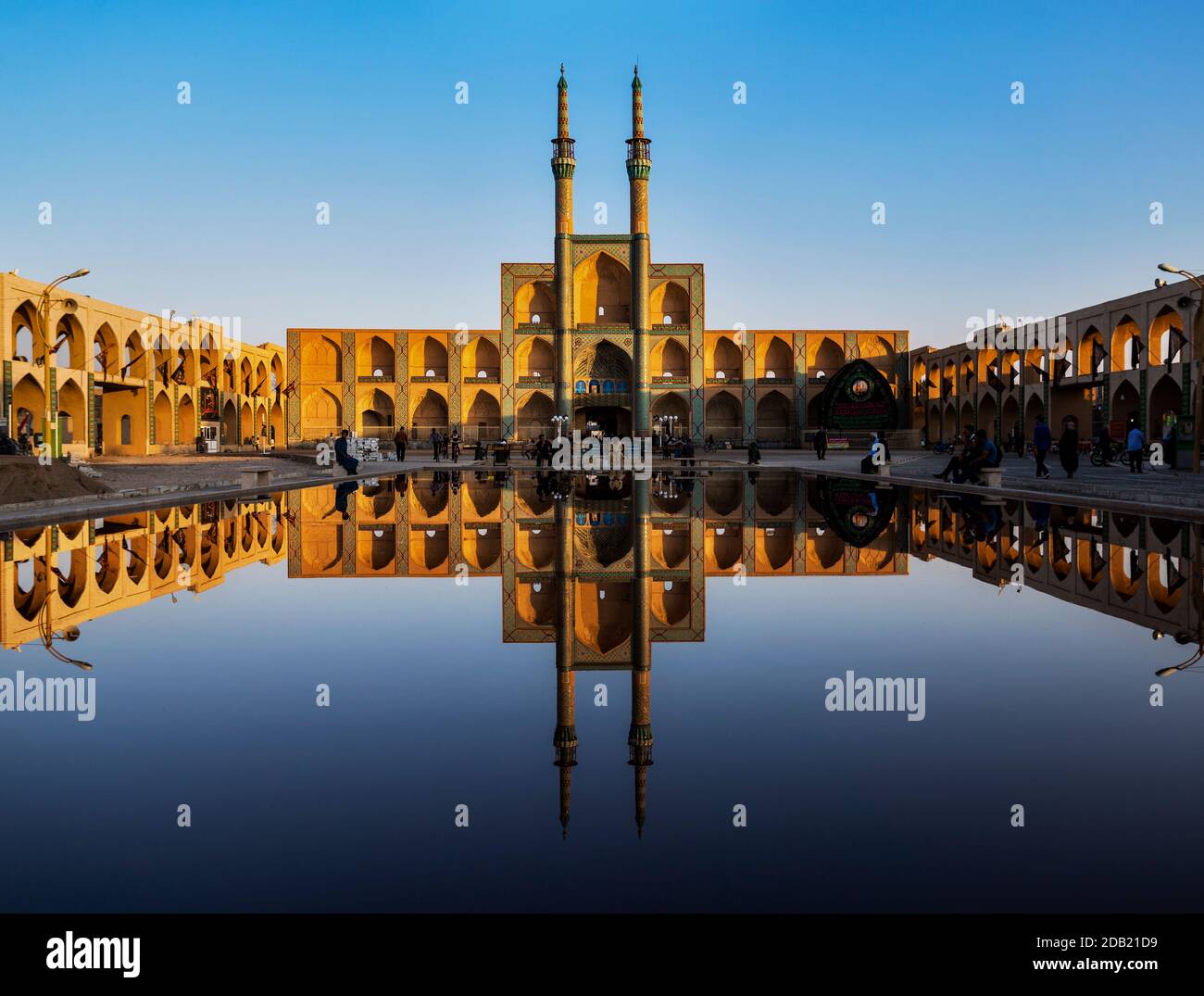 The Amir Chakhmaq Complex is an imposing facade with many alcoves and two tall towers, which in older times was the entrance to a large bazaar. Stock Photo