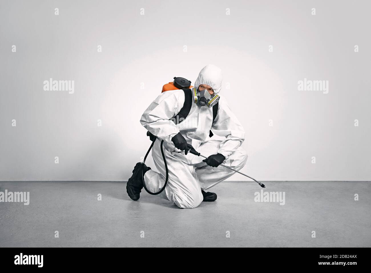 male wearing protective suits and mask as a preventive measure against viruses. Stock Photo