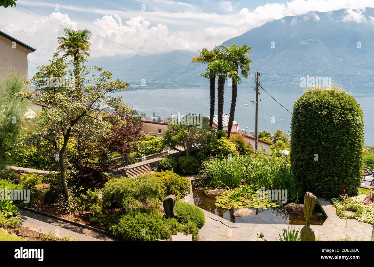 Landscape of lake Maggiore from green garden of Orselina, above Locarno ...