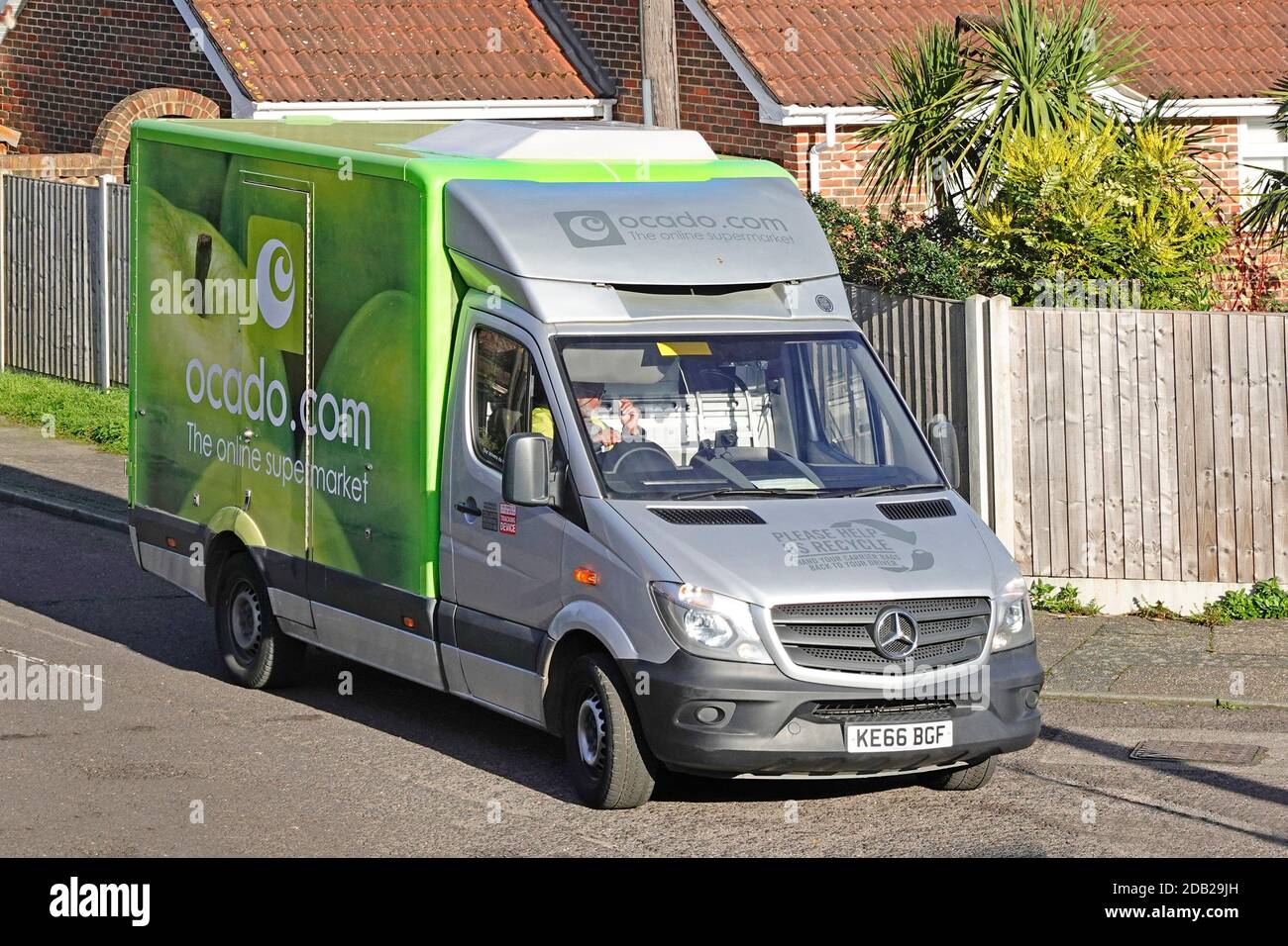 Side & front view from above looking down on green Ocado online grocery