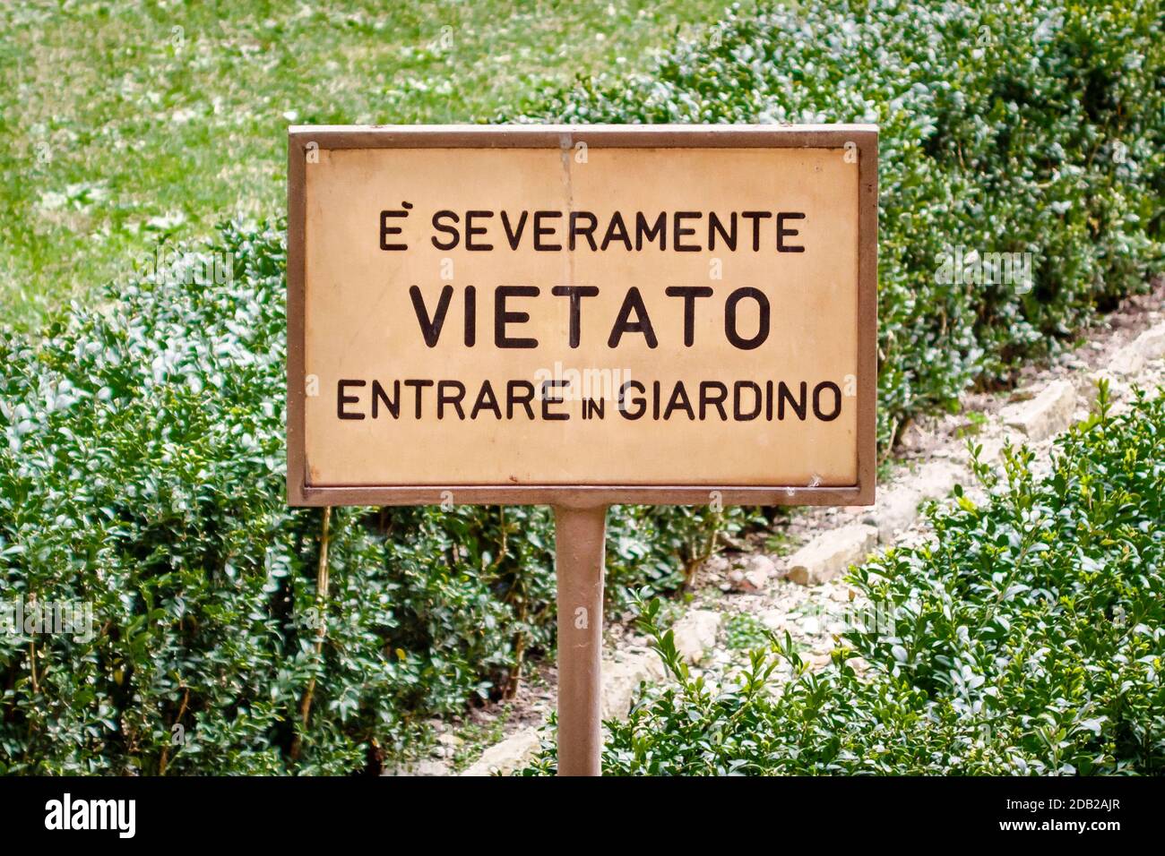 A sign in the cloister of the Laurentian Library in Florence, Italy, reading 'Entry to the garden is strictly forbidden'' Stock Photo