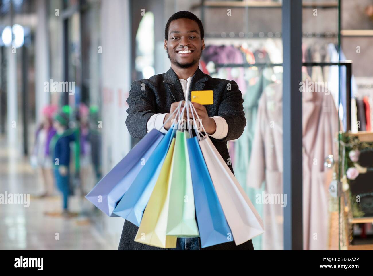 Credit card and a lot of purchases on black friday before holidays Stock Photo
