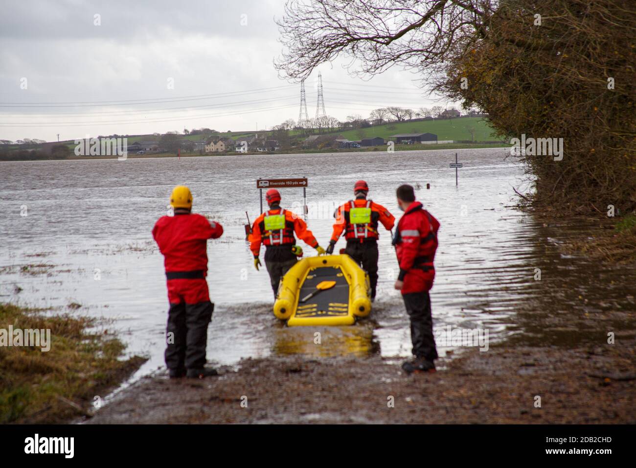 Riverside Caravan Park Lancaster Rd Snatchems Lancashire United Kingdom's 16th November 2020 PoliceFire Ambulance Coast Gurd nd RNLI where called to attend to a trapped motorist at Snatchems who had been caught in flood water Rescue was completed by Lancashire Fire and Rescuce services with out the Inshore Hovercraft being launched Two swift water rescue technicians used a rescue sled to enter the water and locate the vehicle. The driver was rescued by the Firebrigade Stock Photo