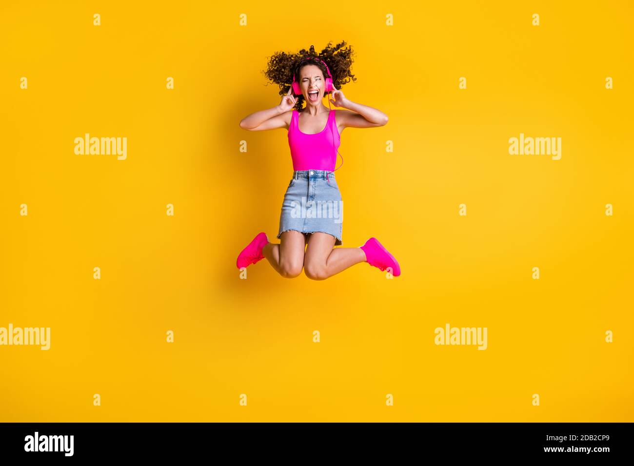 Full length photo of crazy funny pretty youngster lady jump high listen earphones rejoice song rocker metal music wear pink tank top mini skirt shoes Stock Photo - Alamy Full length photo of crazy funny pretty youngster lady jump high listen earphones rejoice song rocker metal music wear pink tank top mini skirt shoes Stock Photo - Alamy