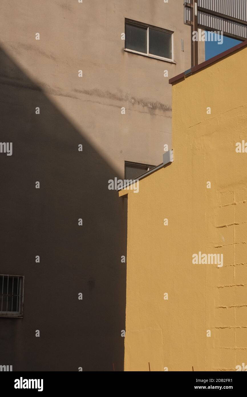 A vertical shot of cream and yellow building facade walls Stock Photo ...