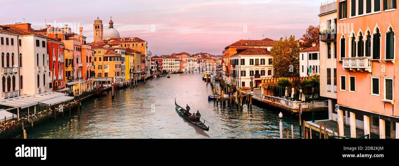 Romantic Venice town over sunset. View from bridge Skalzi for Grand canal. Italy travel and landmarks Stock Photo