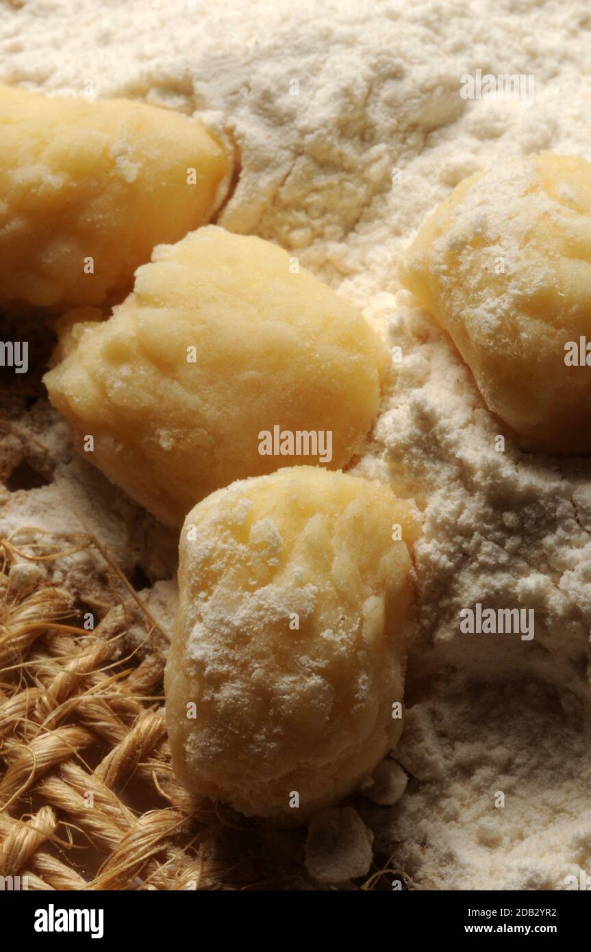 Raw potato gnocchi with flour Stock Photo Alamy