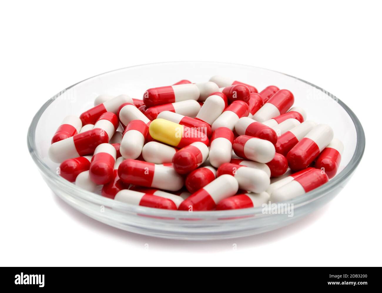 Red capsules isolated on white background Stock Photo - Alamy