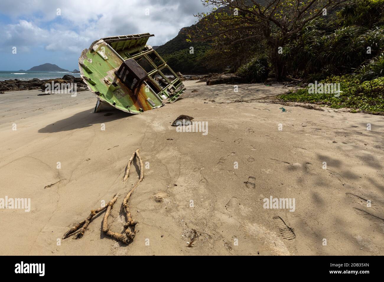 Boats Wreck on a beach of Con Dao in Vietnam Stock Photo
