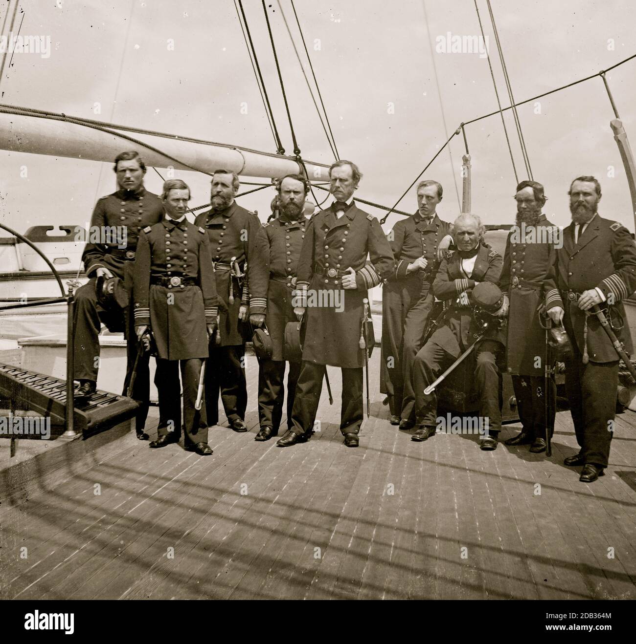 Charleston Harbor, S.C. Rear Admiral John A. Dahlgren (fifth from left) and staff aboard U.S.S. Pawnee. Stock Photo