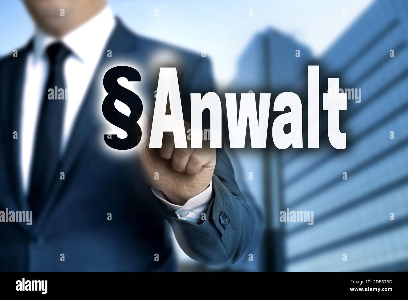 Anwalt (in german Lawyer) touchscreen is operated by businessman. Stock Photo