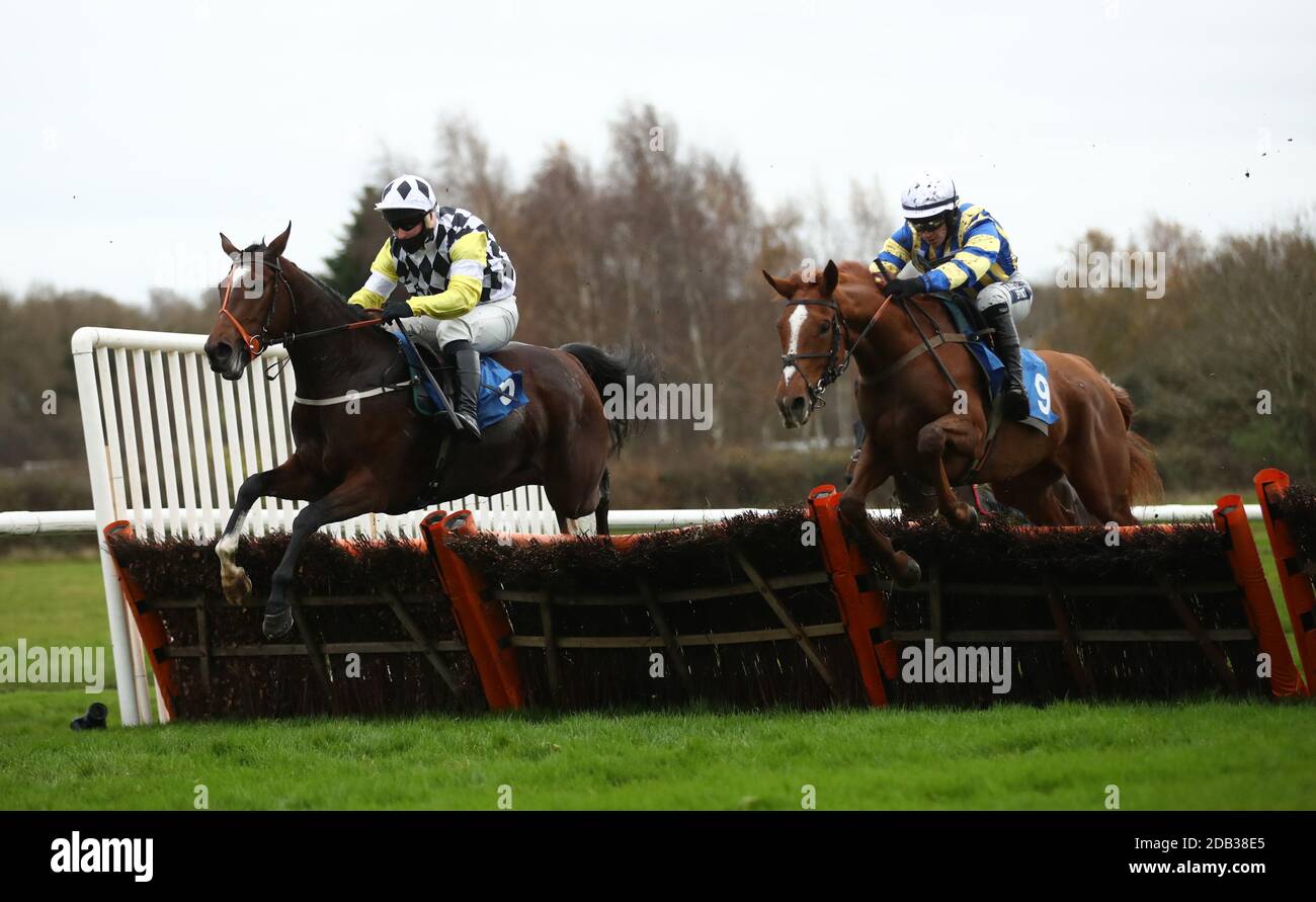 Megan ridden by Jonathan Burke (right) clears the last before going on to win the Graham The Plumbers' Merchant Fillies' Juvenile Hurdle at Leicester Racecourse. Stock Photo