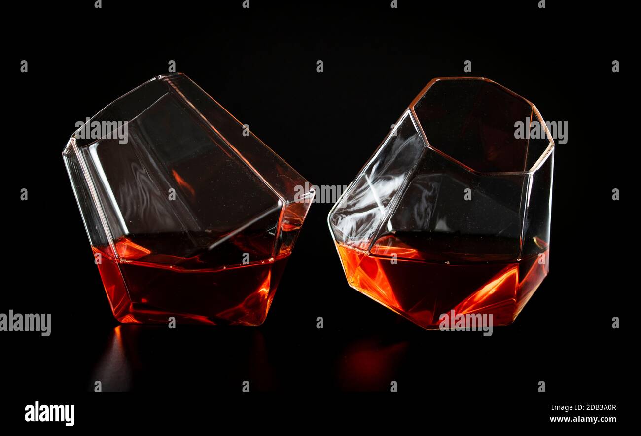 The Seven Deadly Sins portrayed in still life glassware using different colours to convey each emotion or sin Stock Photo