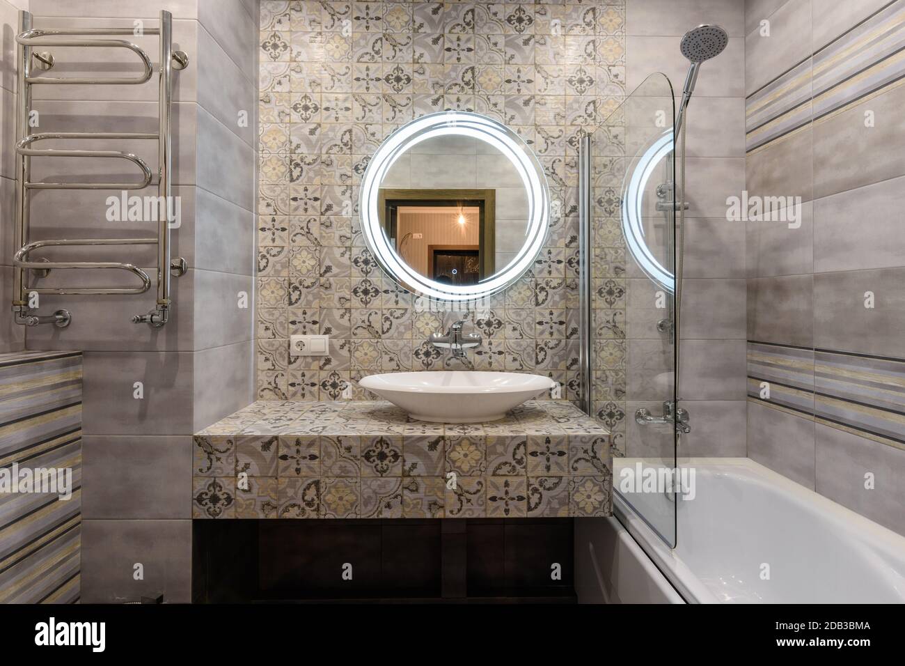 The washstand and bathroom in the interior of a small and modern bathroom  Stock Photo - Alamy, image size:1300x956