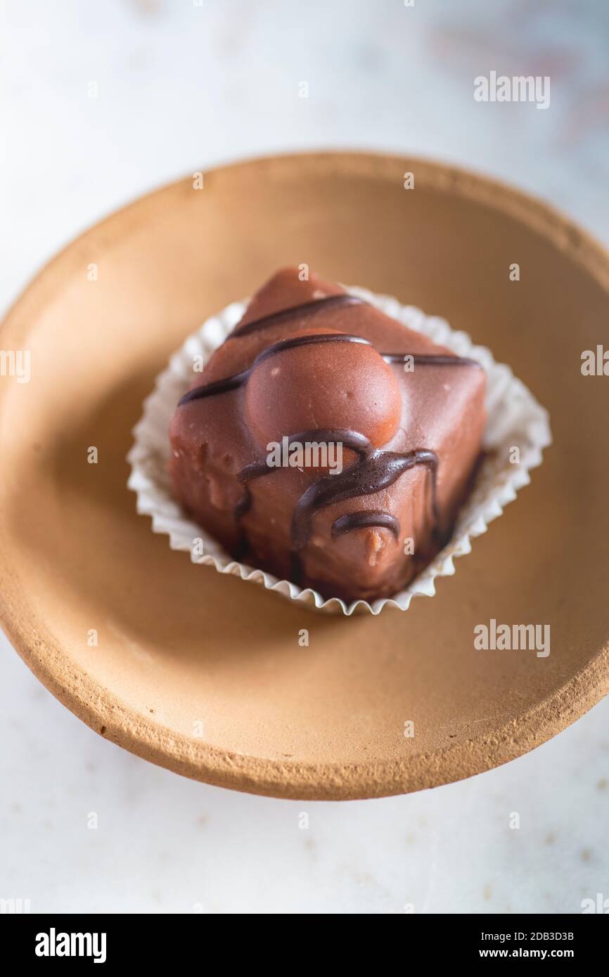 Individual Iced Fondant Chocolate Cakes Stock Photo