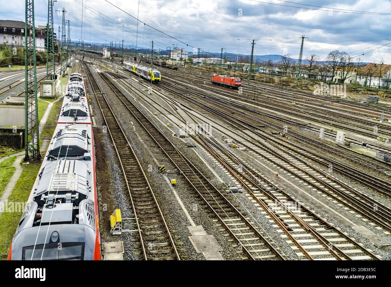 GIESSEN, GERMANY - APRIL 05, 2018: View of the railway station with a lot of Tracks and Train. Stock Photo