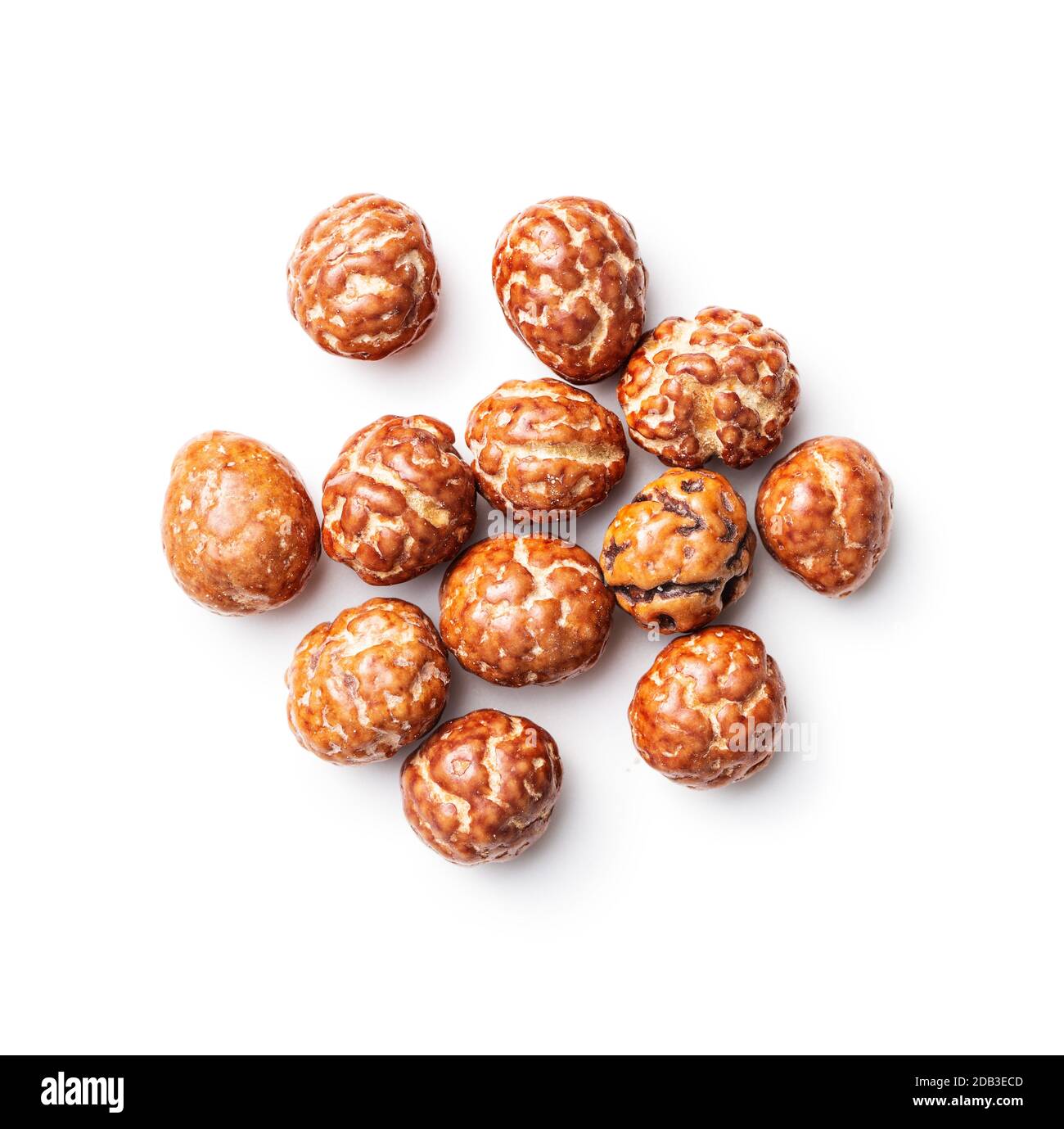 Hazelnuts with sugar icing isolated on white background. Stock Photo