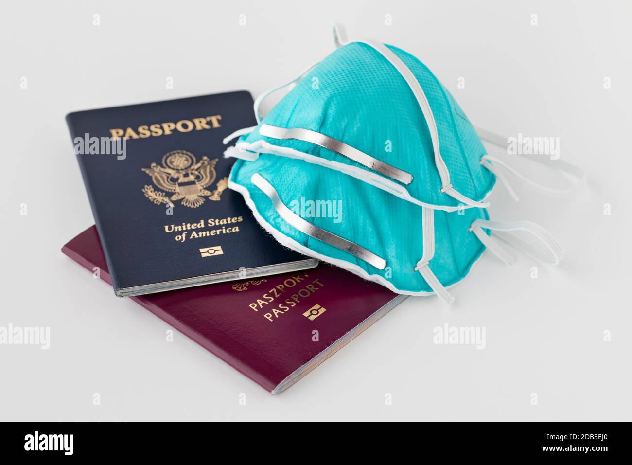 passports and flu, virus masks to protect against coronavirus, global epidemic concept Stock Photo