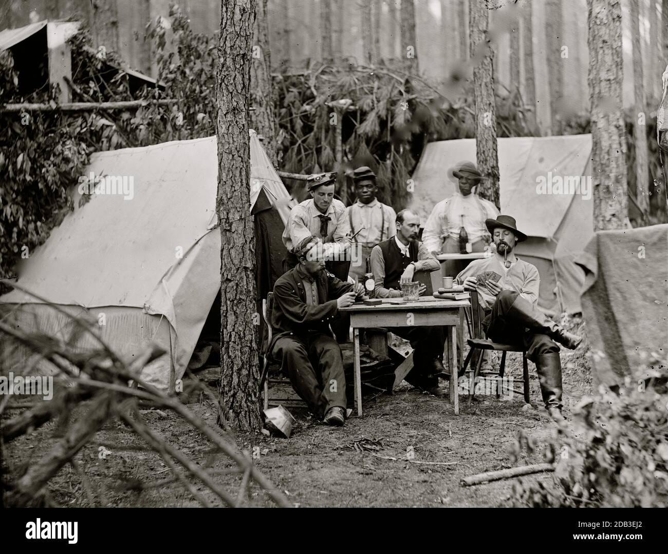 Petersburg, Va. Officers of the 114th Pennsylvania Infantry playing cards in front of tents. Stock Photo