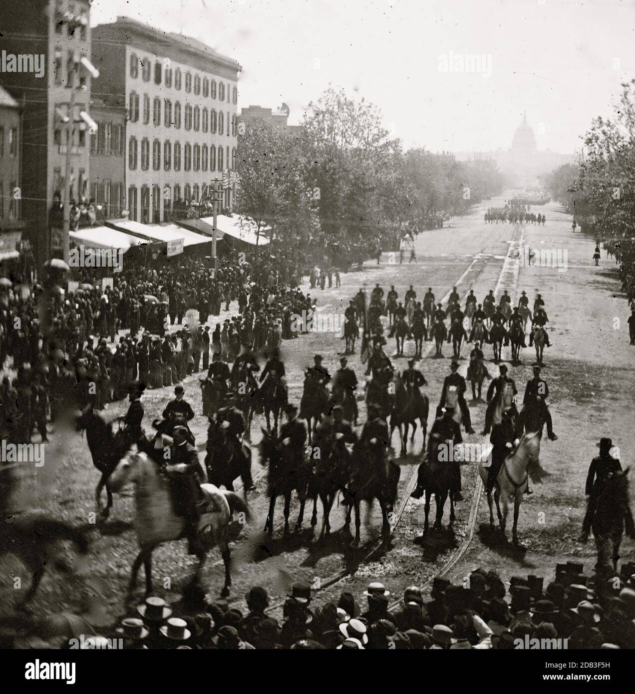 Washington, District of Columbia. The Grand Review of the Army. Cavalry passing on Pennsylvania Avenue near the Treasury. Stock Photo