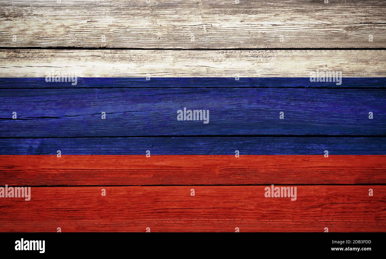 Russian national flag colors painted on old wooden plank background Stock Photo