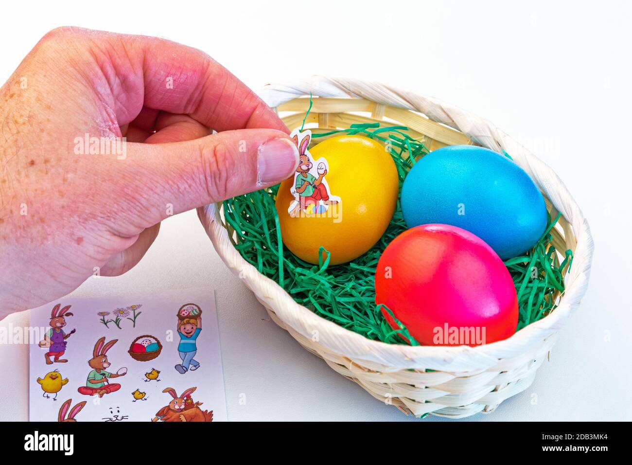 Dyeing and decorating easter eggs Stock Photo