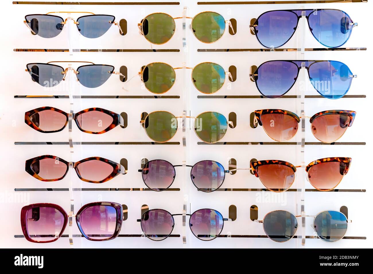 Many sunglasses hi-res stock photography and images - Alamy