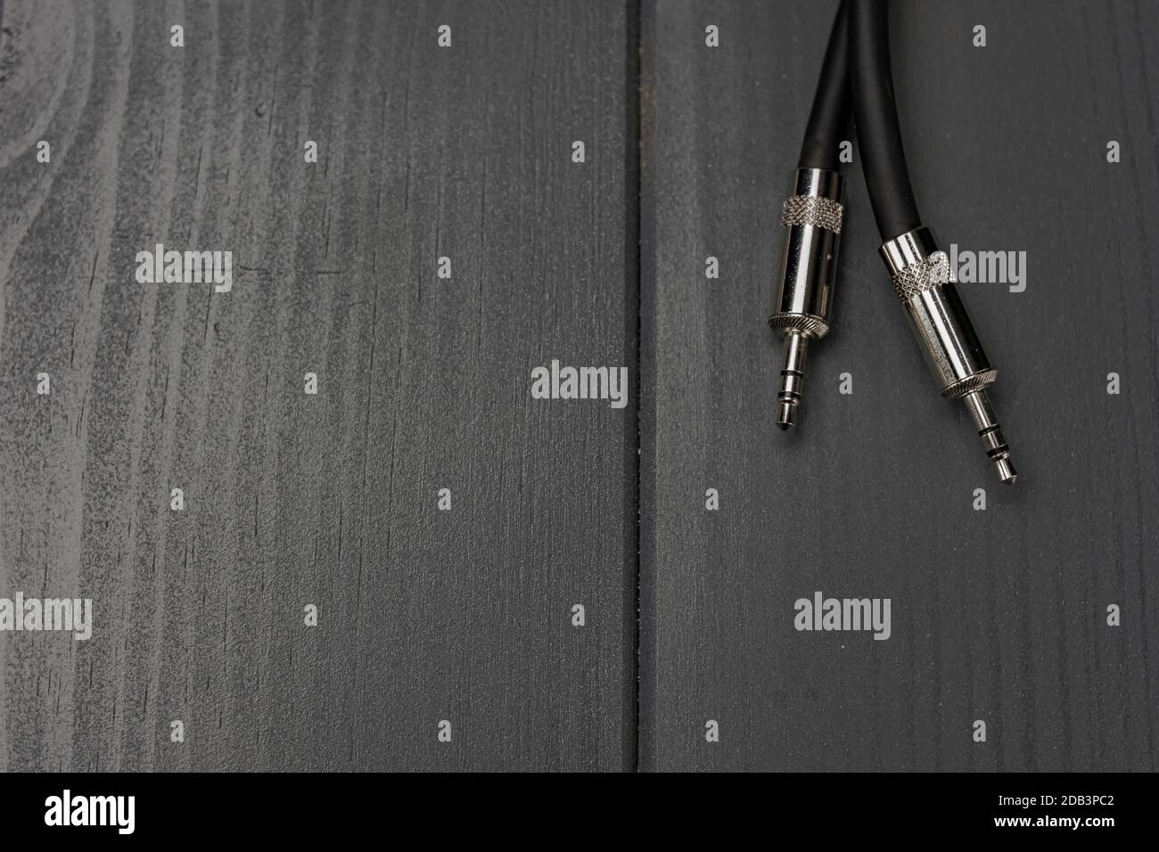 Two male mini jack type audio connectors for connecting audio devices with stereo signals Stock