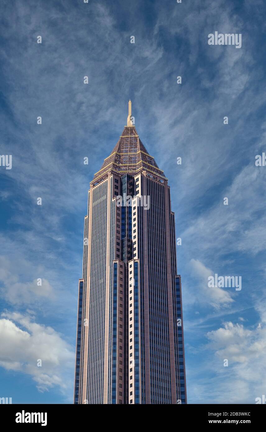 A modern skyscraper under clear blue skies Stock Photo - Alamy