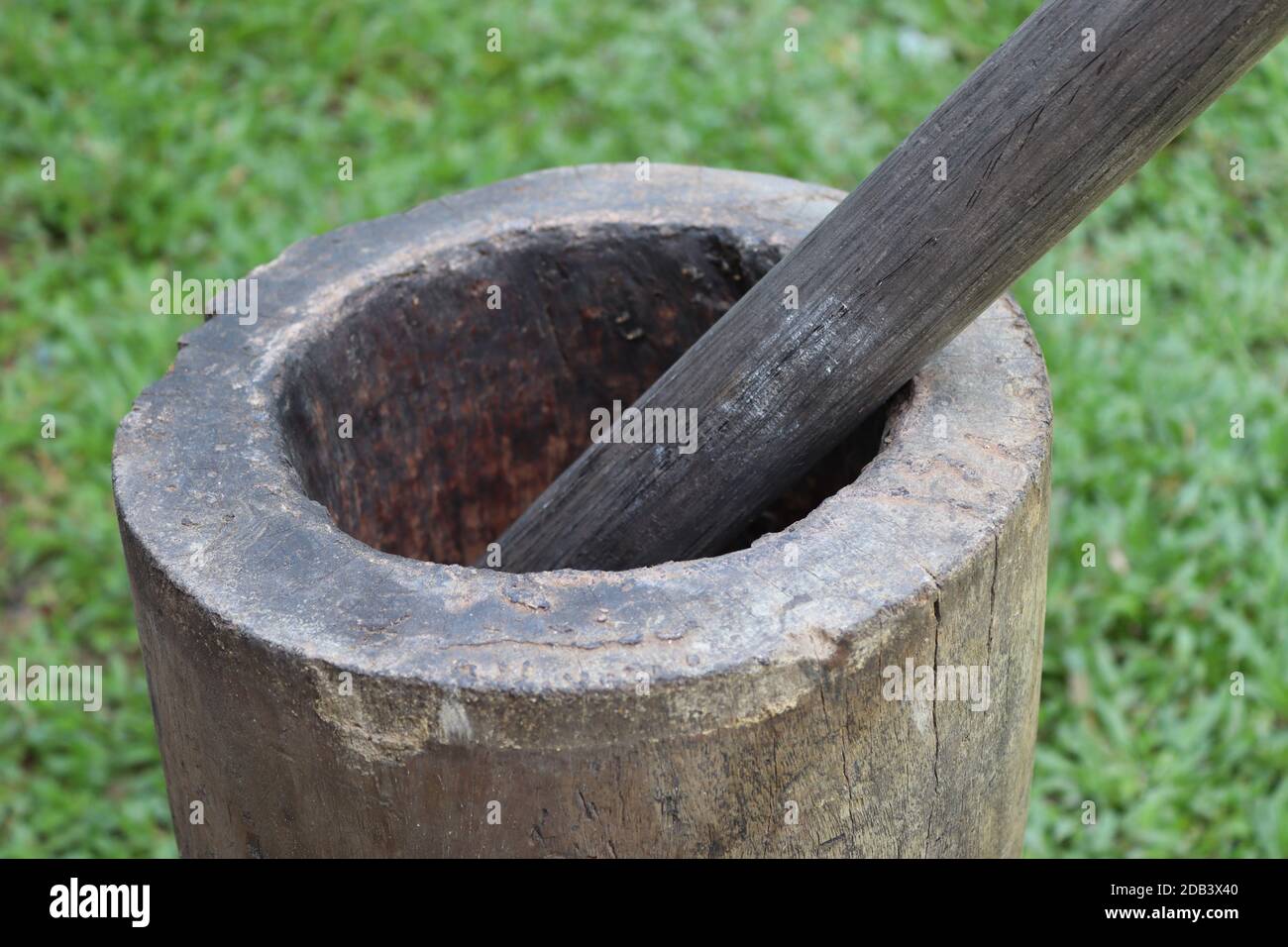 From the history, villagers use this simple item as their grinder to make rise flour, green grain or dhal flour for food and to make local medicines. Stock Photo