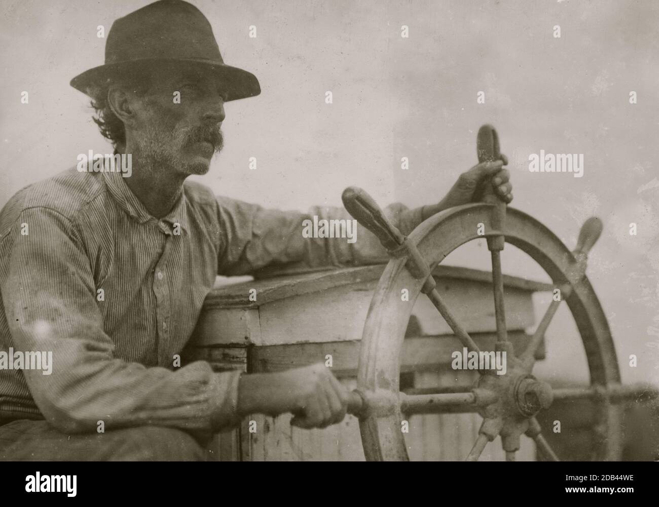 The Skipper on the Oyster Barge, Mobile Bay. Location: Bayou La Batre, Alabama.. Stock Photo